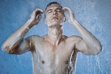 Contrasting shower by a man for prostate health